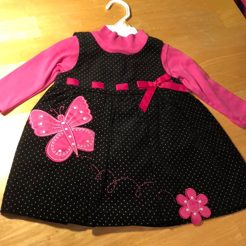 Corduroy dress and pink onesie